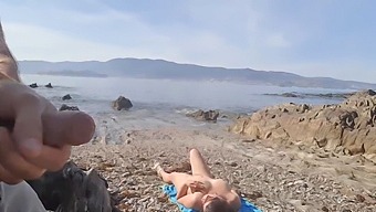 A Daring Man Reveals His Genitals To A Nudist Milf Who Reciprocates By Performing Oral Sex On Him At A Beach